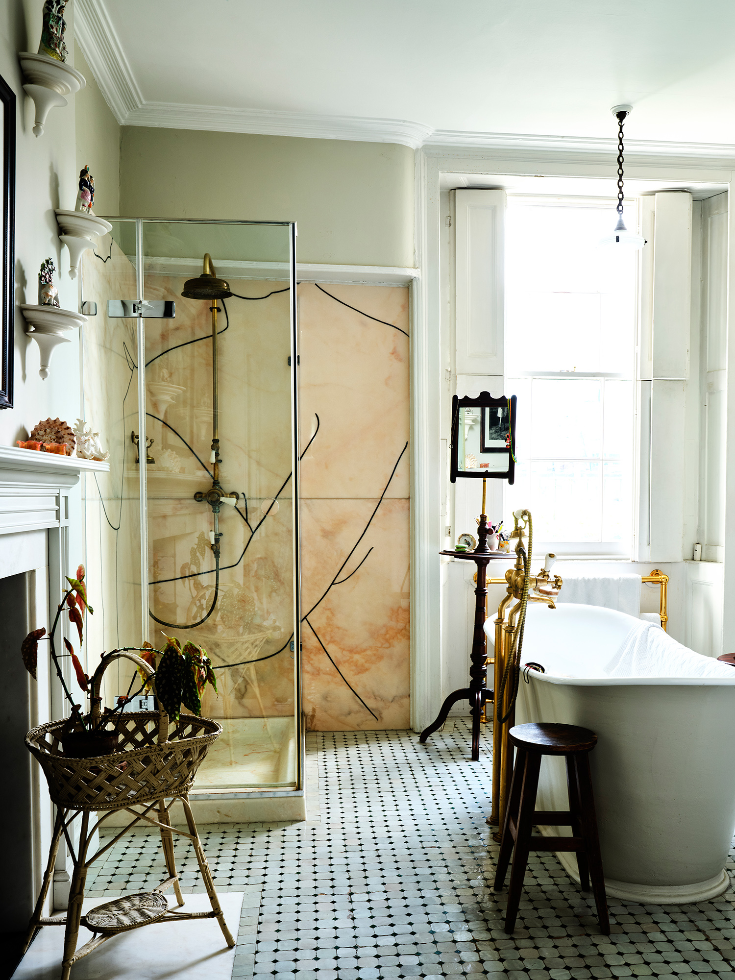 Art on tap: Gary Hume chiselled channels into the marble walls behind the shower to look like pencil lines