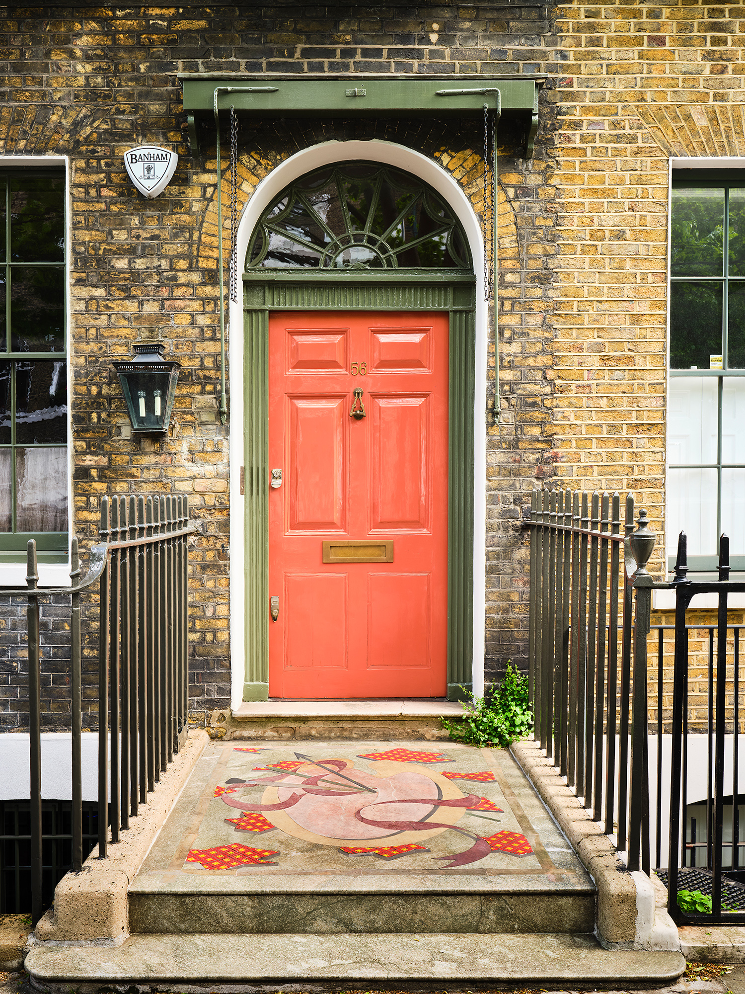 Big-door prize: a mosaic of the artists’ palettes on the front step
