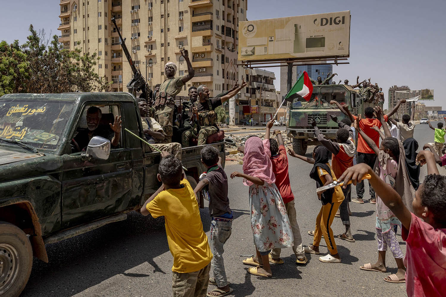 SAF troops are welcomed on the streets of Khartoum after the RSF retreated from the capital