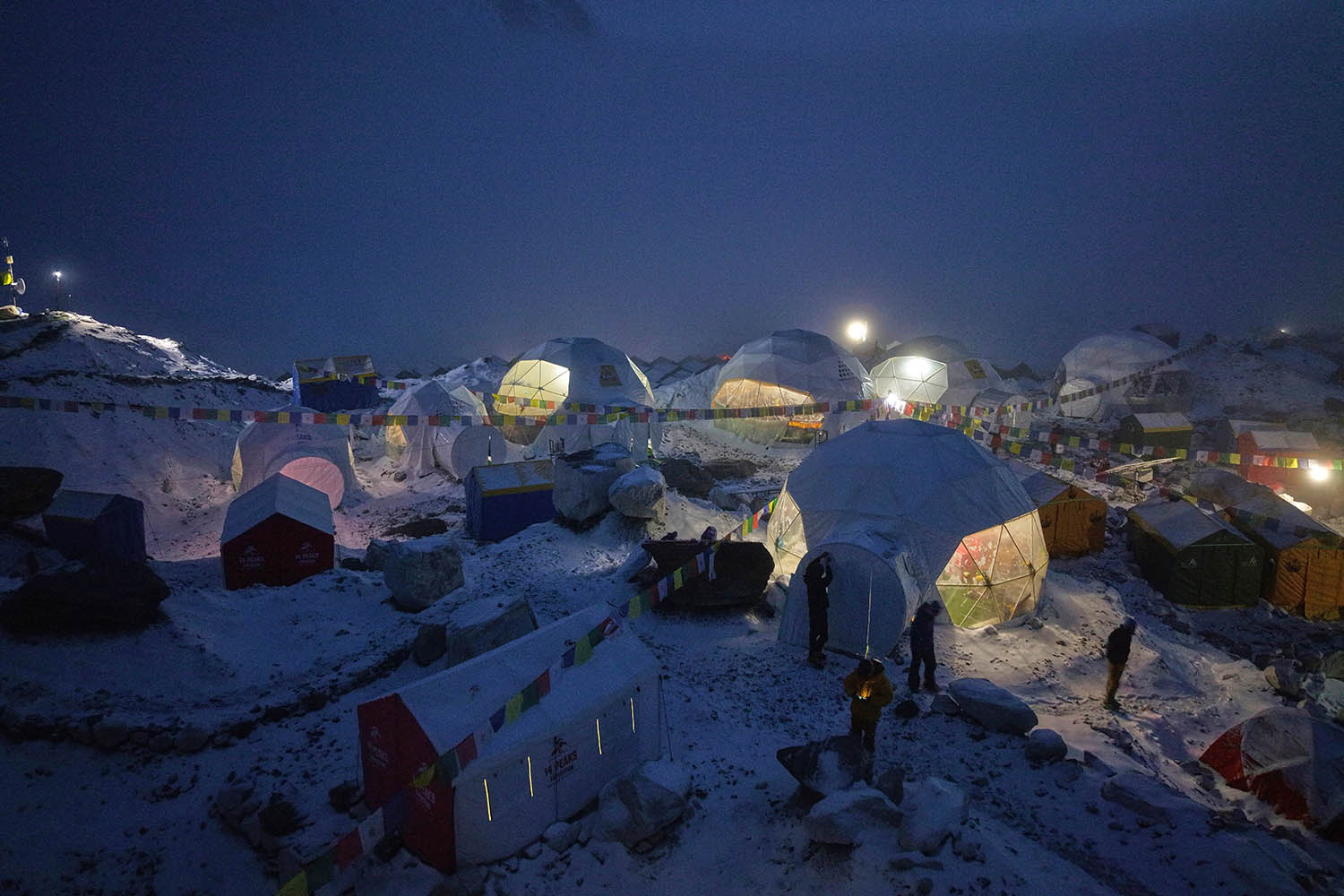 Everest base camp becomes a village of tents during the climbing season between April  and May, when conditions are at their fairest.