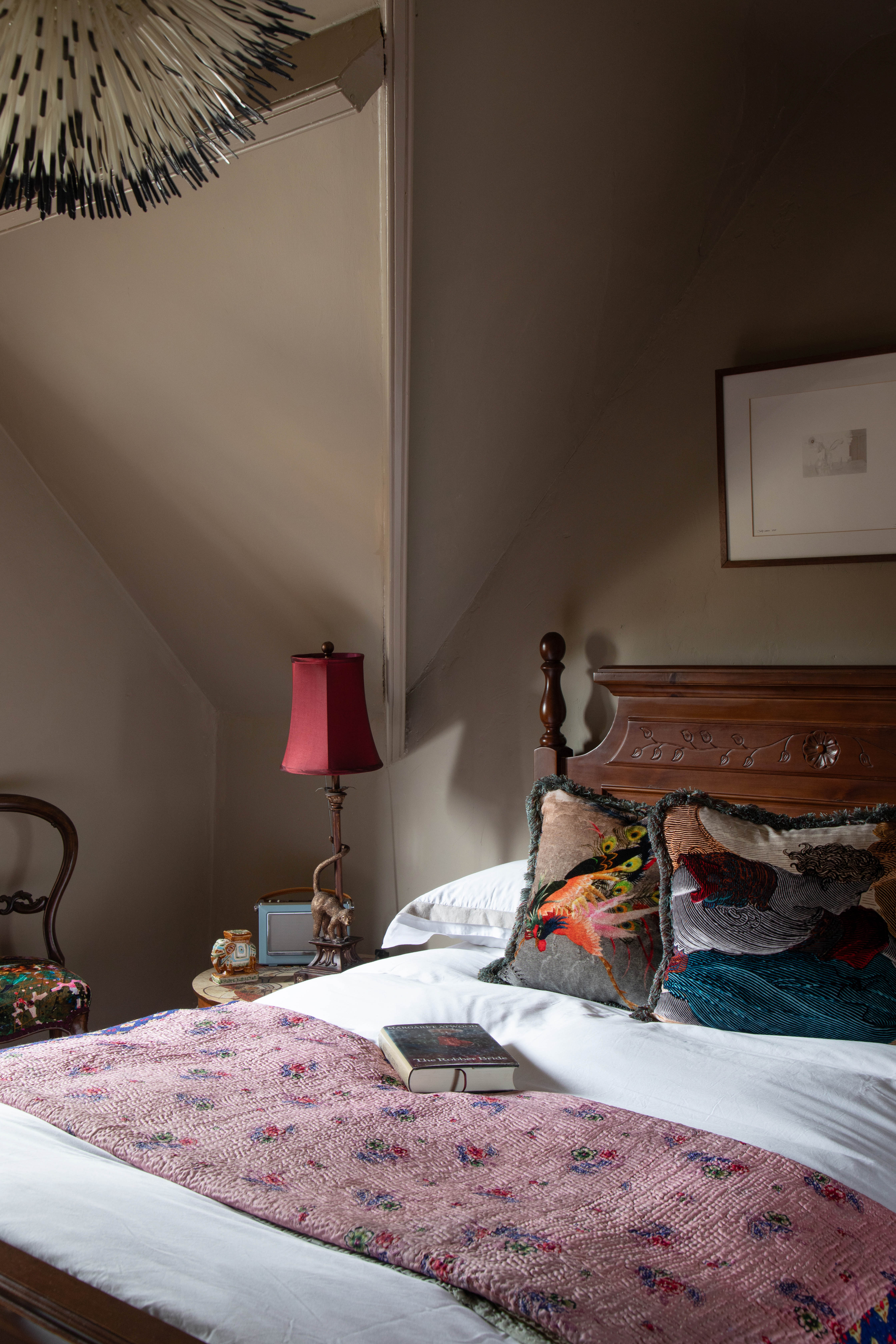 Paradise Lost-inspired cushions in the bedroom