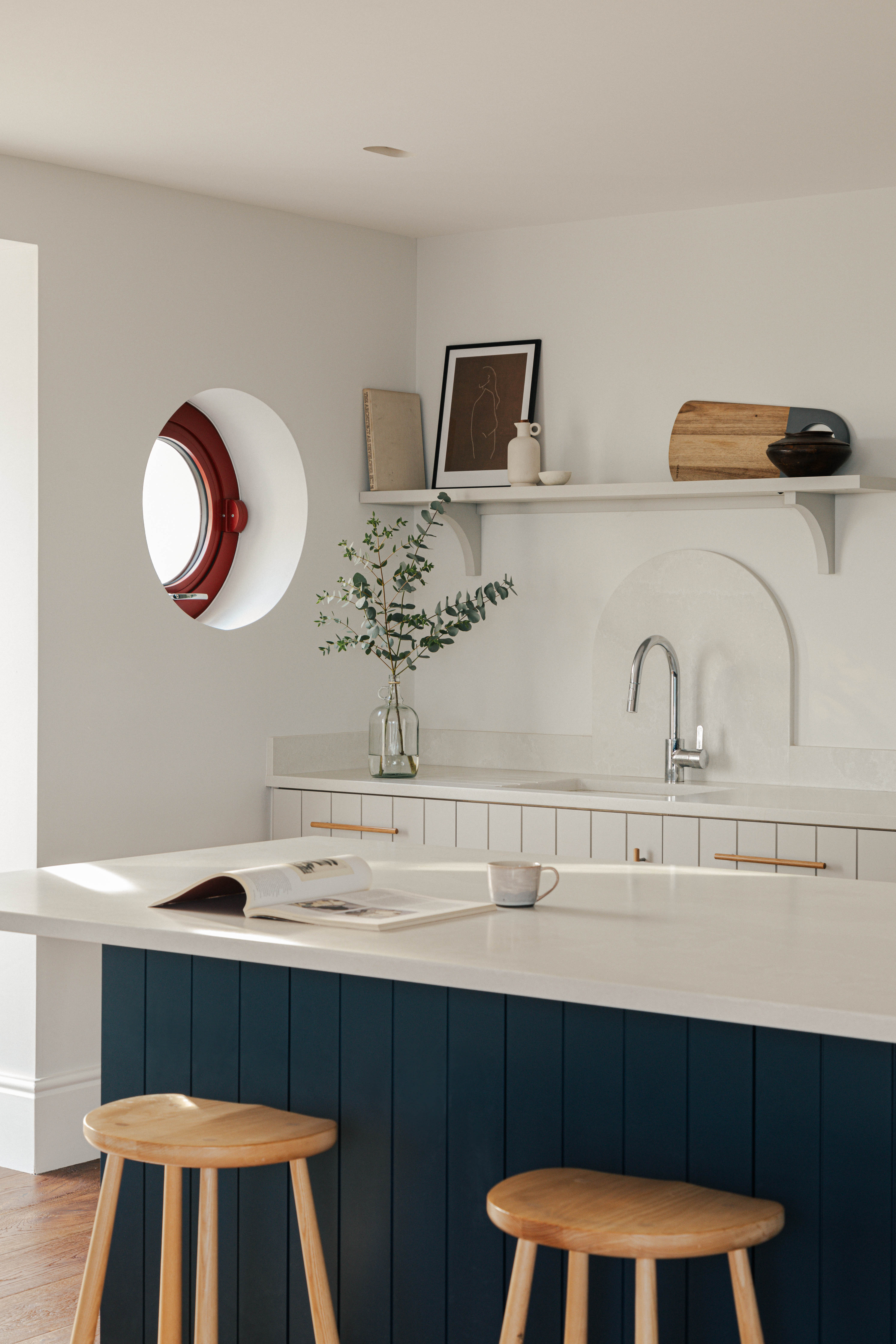 All aboard: port windows in the kitchen add to the feeling of being on a boat