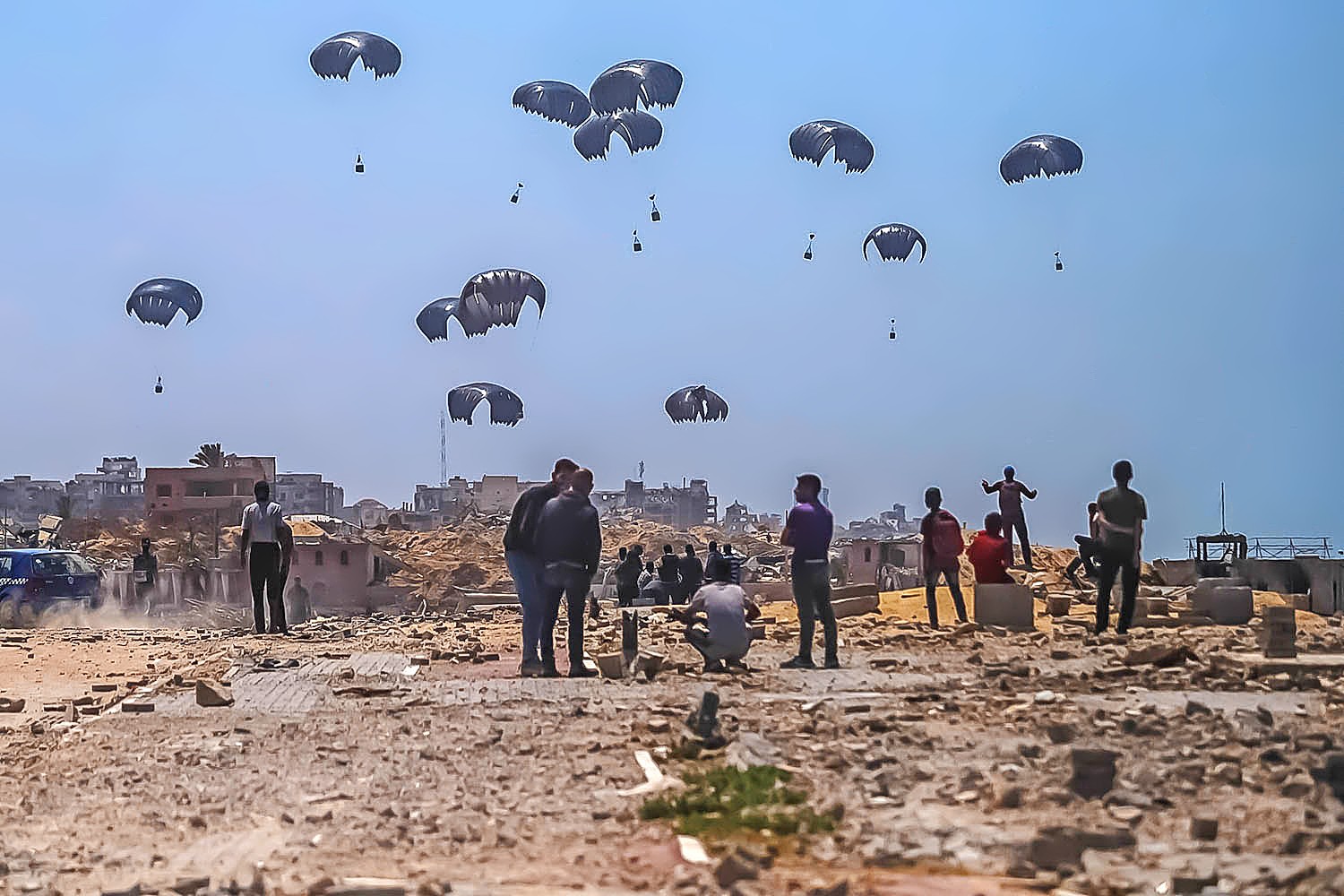 Packages of aid land in Gaza