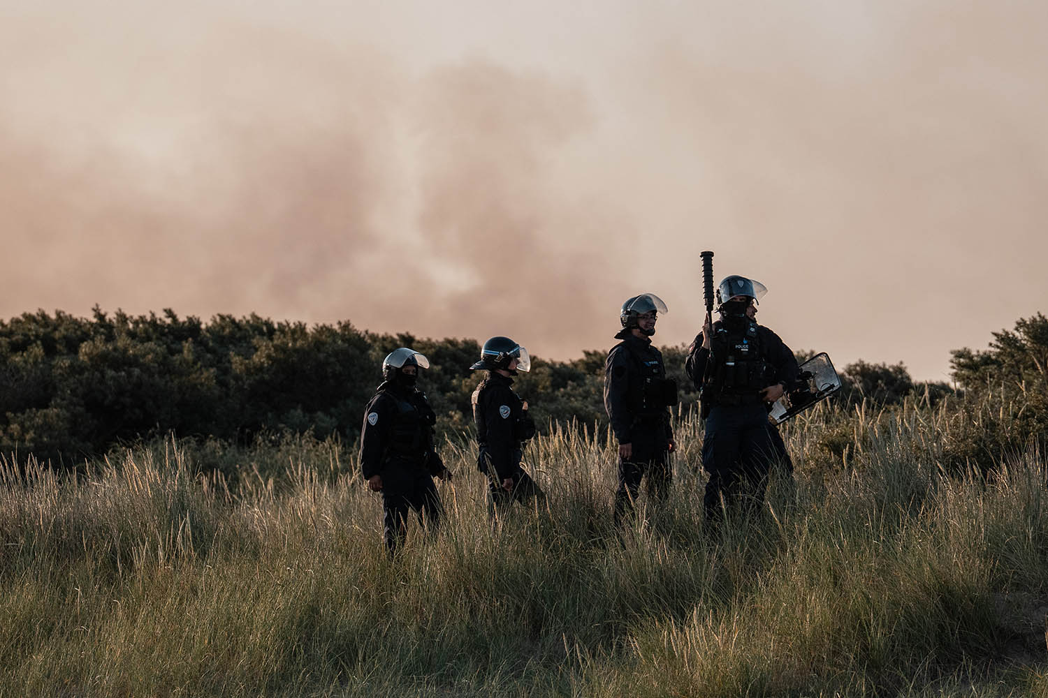 Police stay vigilant as they patrol the dunes at Gravelines