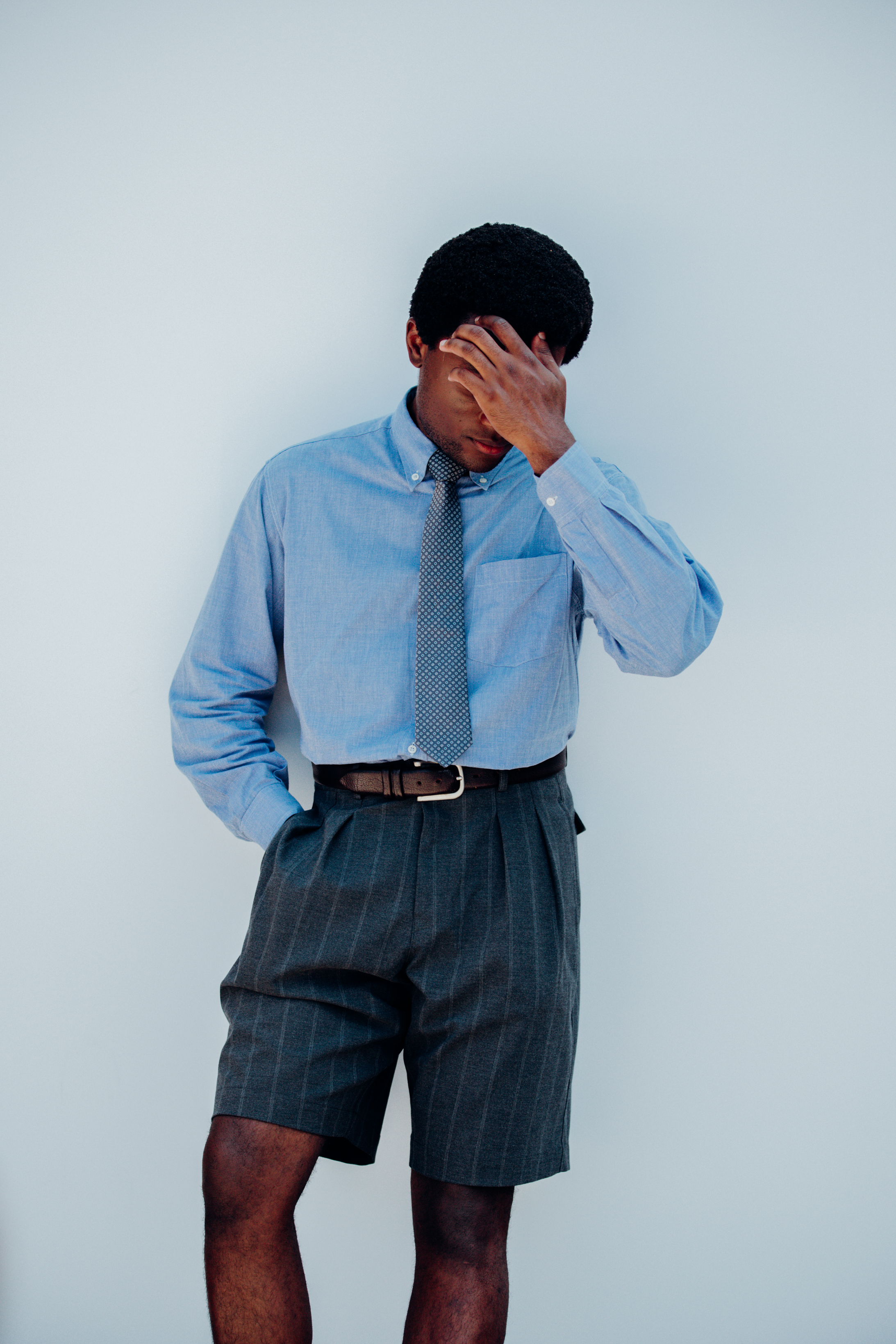 A suited look gets a cool spin with pinstripe Bermuda shorts