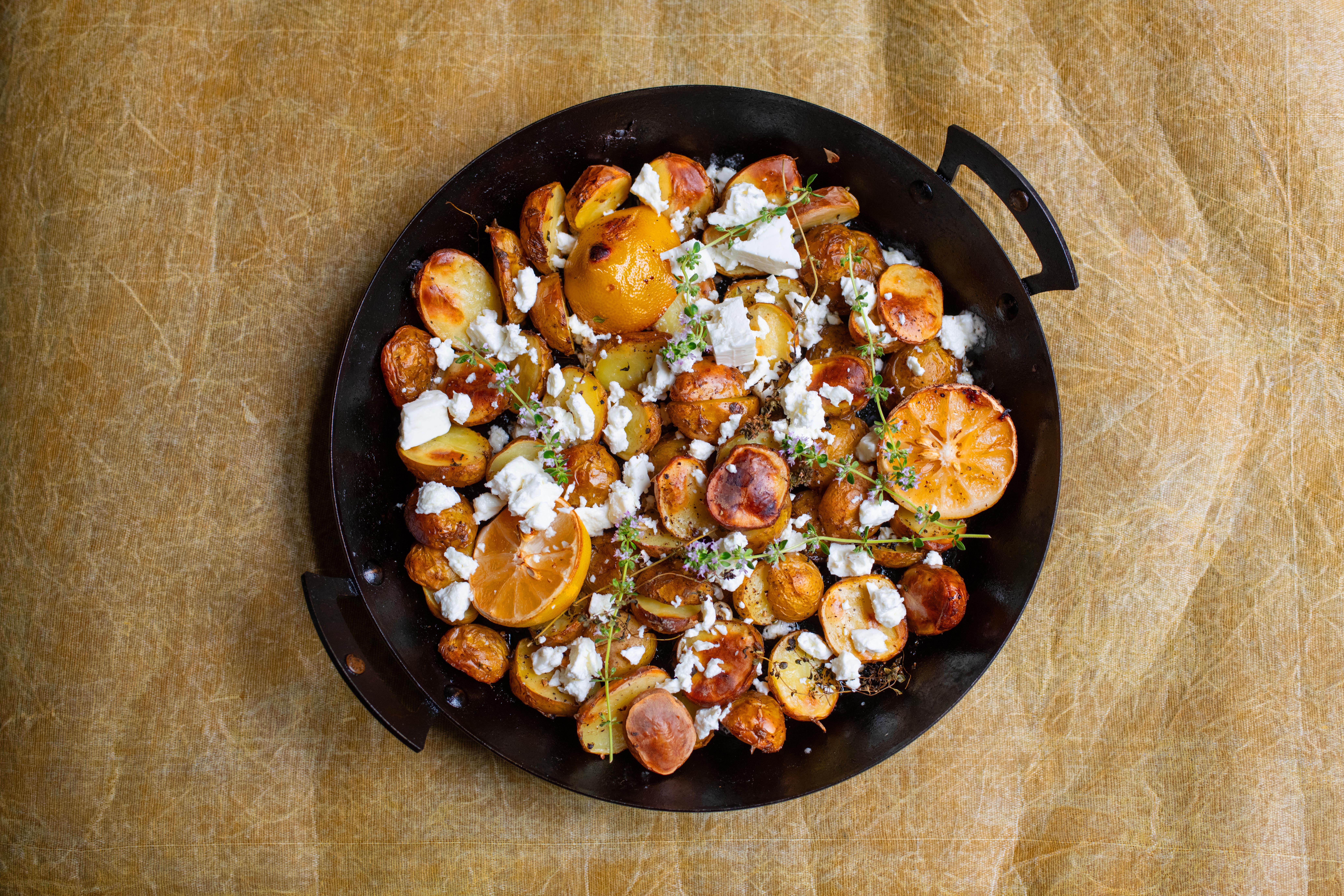 Nigel Slater’s midweek dinner: lemon roast potatoes with thyme and feta