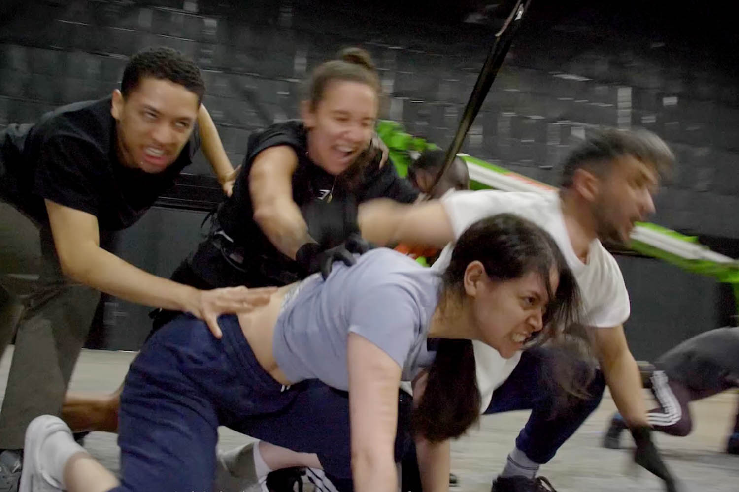 Members of the cast of The Hunger Games training for acrobatic and fighting scenes