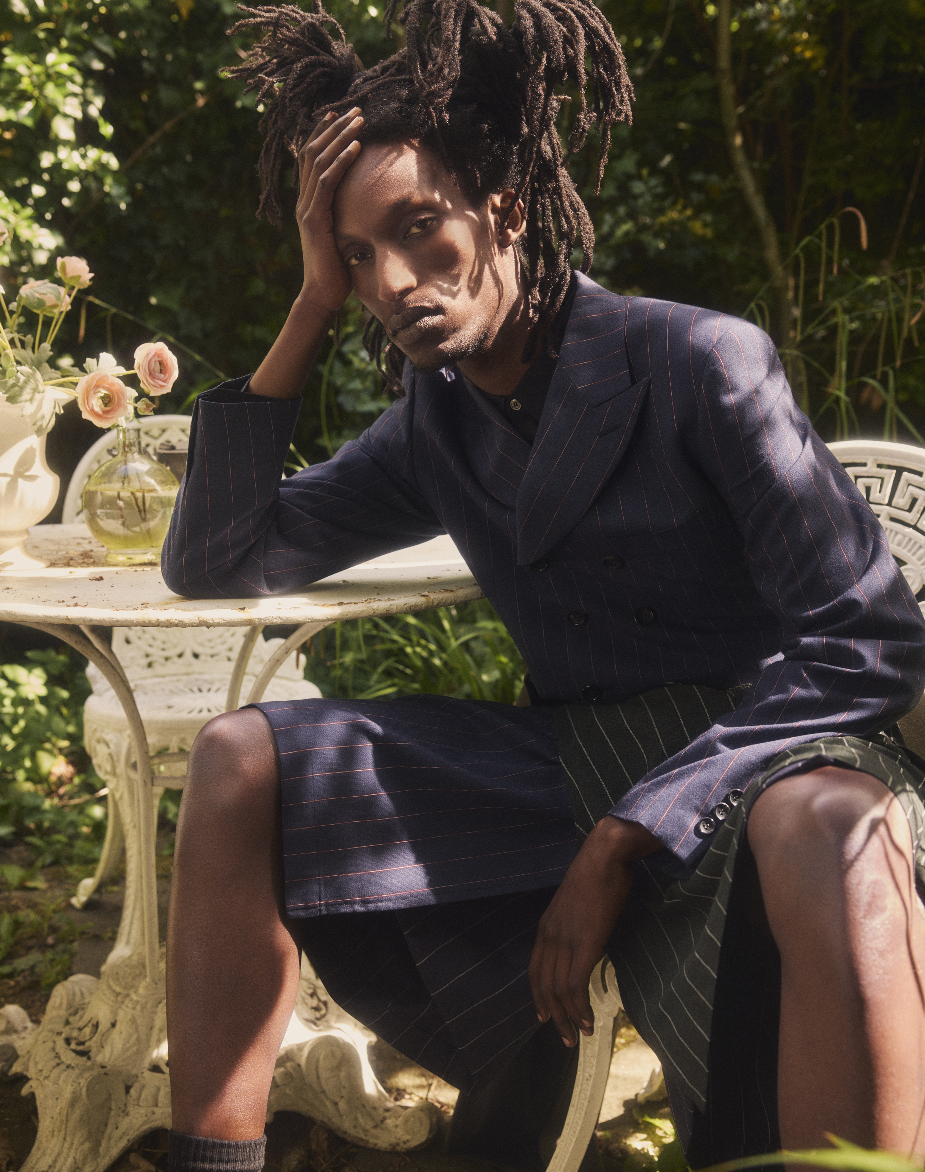 Jacket, shirt, skirt and socks all by Comme des Garçons Homme Plus