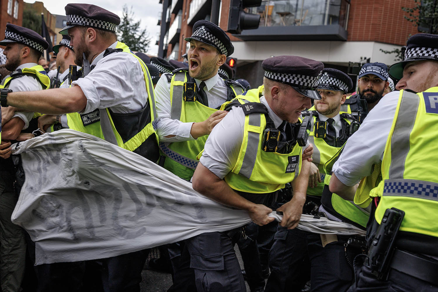 Arrests made in clashes outside London asylum hotel