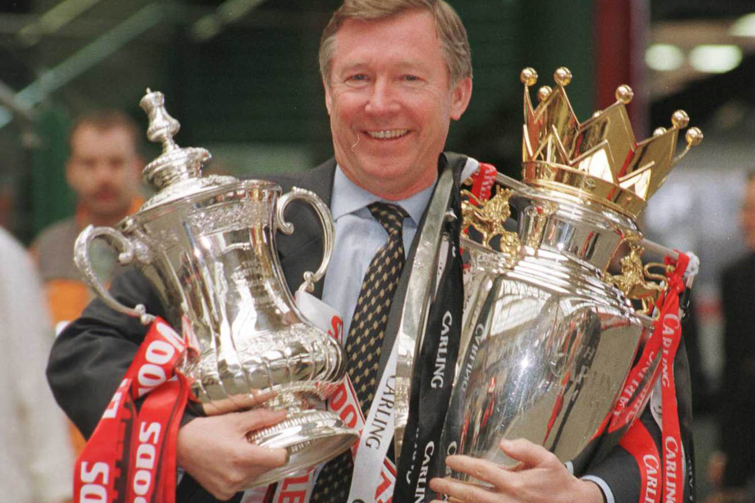 Alex Ferguson with the FA Cup and Premier League trophy in 1996