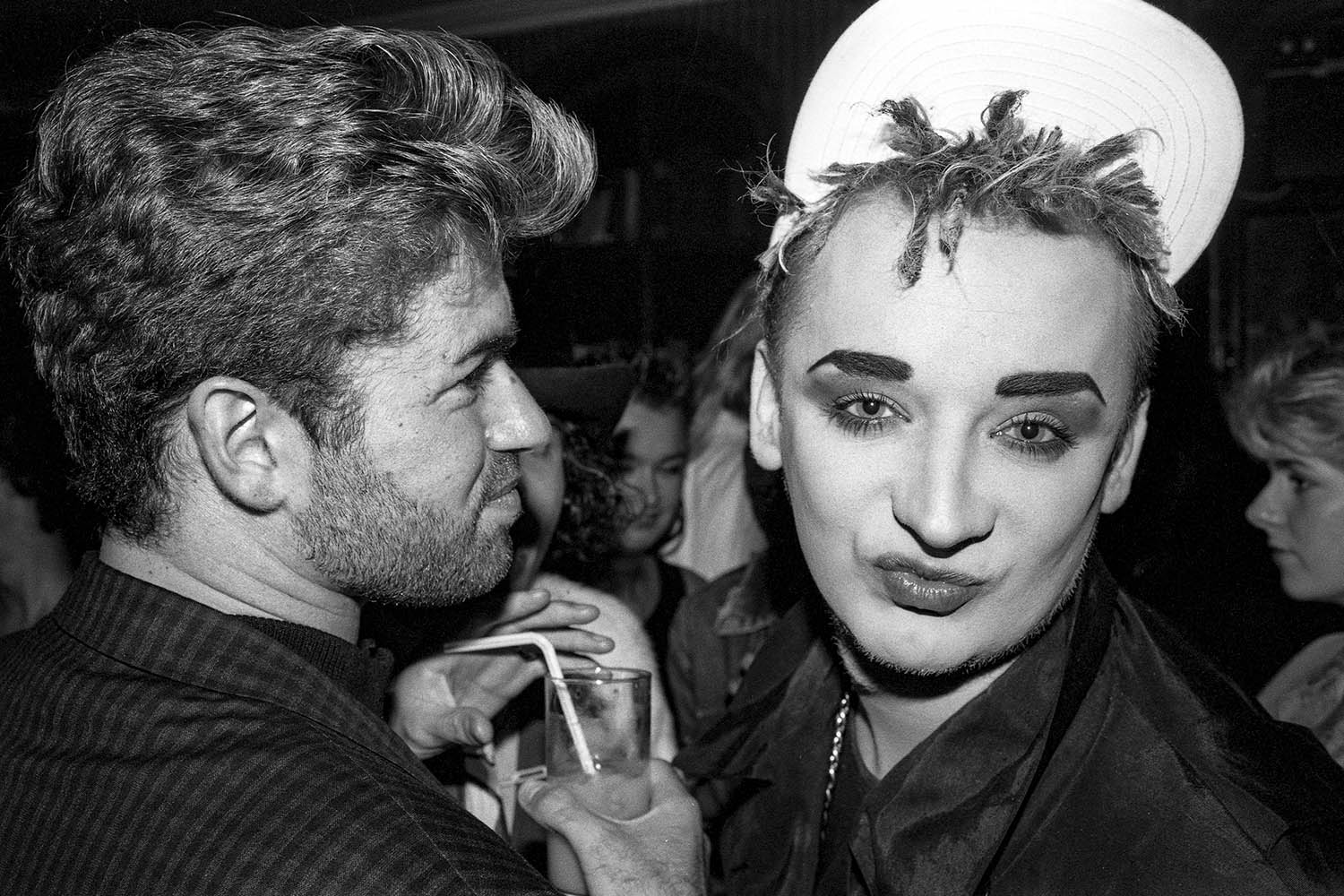 George Michael and the Blitz’s ‘hat-check girl’ Boy George at the Limelight. © David Koppel