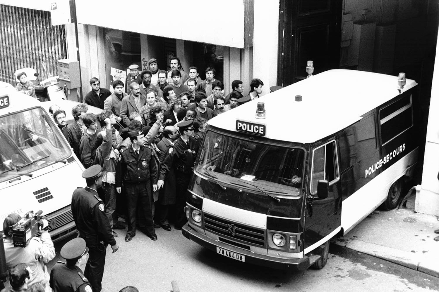 Police at the scene following the assassination